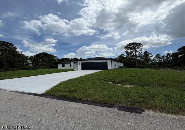 Photo 3 of Single family home for sale at 1052 Grove St E, Lehigh Acres, FL 33974 | MLS# 2026038964 | Listing updated on 2026-09-16