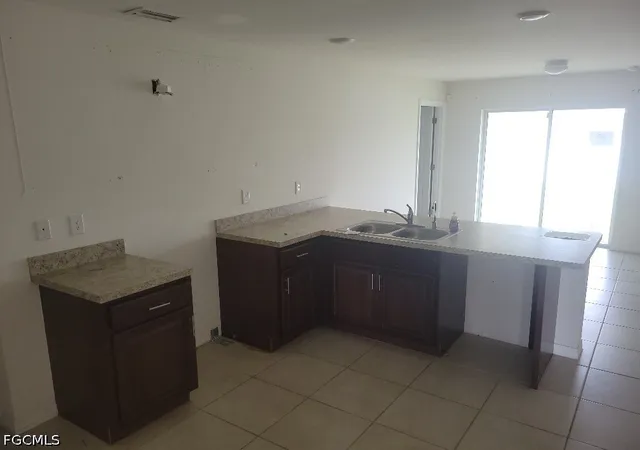 Photo 1 of Sale Pending at 1125 NE 36th Street, Cape Coral, FL 33909 | MLS# 2026038990 | Listing updated on 2026-10-16