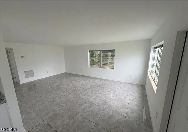 Photo 3 of Sale Pending at 1002 Adams Ave, Lehigh Acres, FL 33936 | MLS# 2026039002 | Listing updated on 2026-10-03