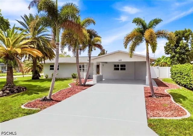 Photo 1 of Sale Pending at 402 Ne 14th Place, Cape Coral, FL 33909 | MLS# 2026039038 | Listing updated on 2026-09-21