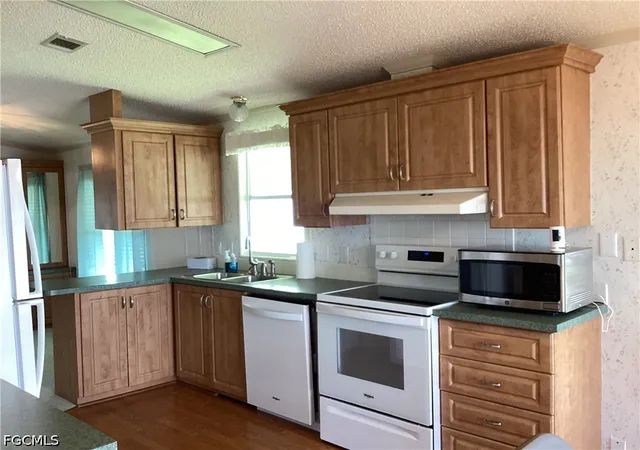 Photo 3 of Manufactured home for sale at 9742 Sugarberry Way, Fort Myers, FL 33905 | MLS# 2026039119 | Listing updated on 2026-09-25