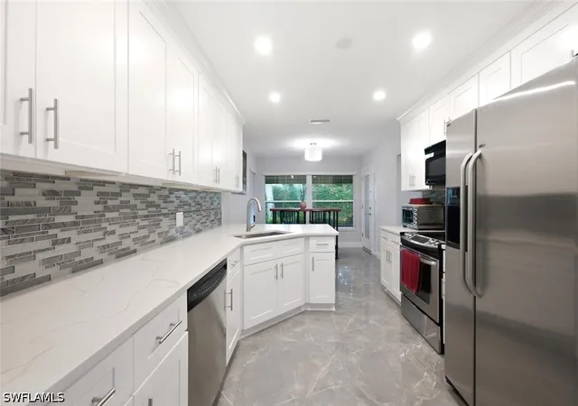 Single family home for sale at 756 Reef Point Cir, Naples, FL 34108 | MLS# 226032795