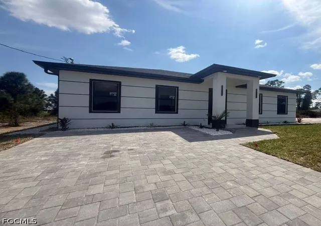 Photo 1 of Single family home for sale at 717 Devon St, Lehigh Acres, FL 33974 | MLS# 2026039135 | Listing updated on 2026-09-21