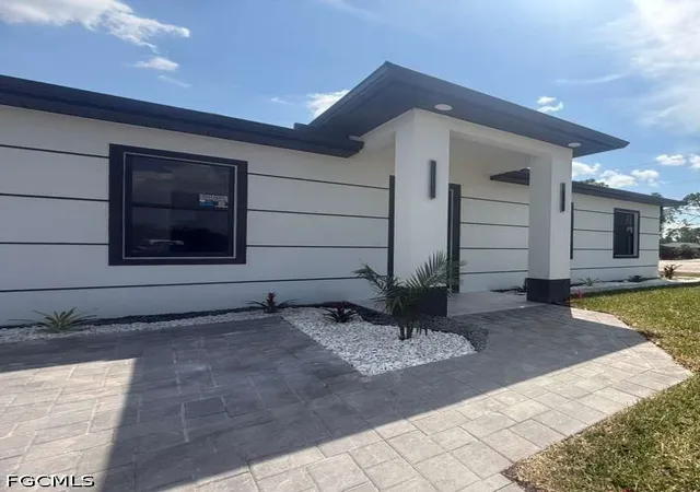 Photo 2 of Single family home for sale at 717 Devon St, Lehigh Acres, FL 33974 | MLS# 2026039135 | Listing updated on 2026-09-21