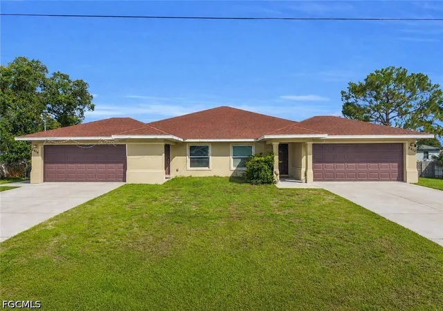 Photo 1 of Multi family home for sale at 2412/2414 Richard Ave S, Lehigh Acres, FL 33973 | MLS# 2026039149 | Listing updated on 2026-09-17
