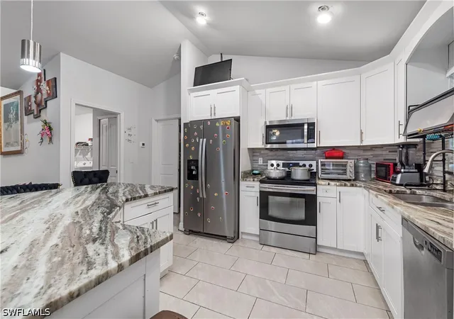 Photo 3 of Single family home for sale at 2618 Helen Cir, Lehigh Acres, FL 33971 | MLS# 226033116 | Listing updated on 2026-09-29
