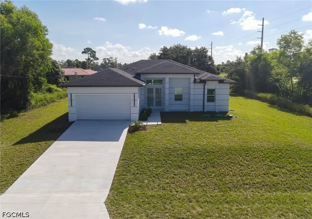Photo 1 of Single family home for sale at 100 Denis Ave N, Lehigh Acres, FL 33971 | MLS# 2026039468 | Listing updated on 2026-09-26