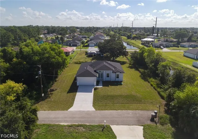 Photo 2 of Single family home for sale at 100 Denis Ave N, Lehigh Acres, FL 33971 | MLS# 2026039468 | Listing updated on 2026-09-26