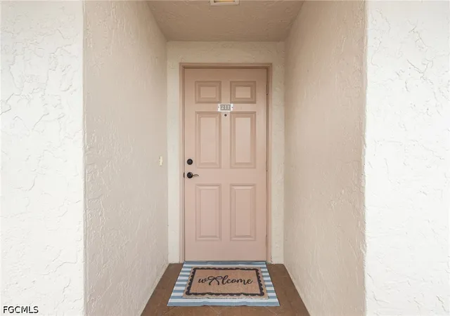 Listing Photo 2 - Condo for sale in building located at 1781 Pebble Bch Dr, Fort Myers, FL 33907 - Unit #211
