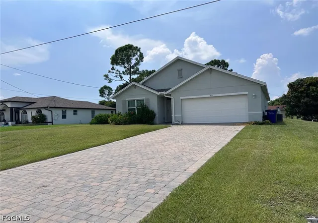 Photo 1 of Single family home for sale at 911 Unice Ave N, Lehigh Acres, FL 33971 | MLS# 2026039643 | Listing updated on 2026-09-21