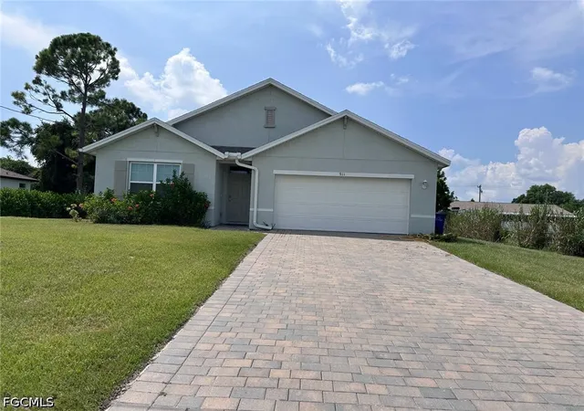 Photo 2 of Single family home for sale at 911 Unice Ave N, Lehigh Acres, FL 33971 | MLS# 2026039643 | Listing updated on 2026-09-21