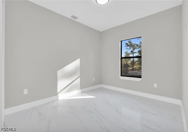 Photo 4 of Sale Pending at 1235 Claremont St E, Lehigh Acres, FL 33974 | MLS# 2026039722 | Listing updated on 2026-10-22
