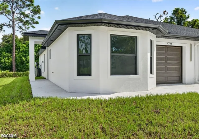 Photo 2 of Multi family home for sale at 4704 4706 30th Street Sw, Lehigh Acres, FL 33973 | MLS# 2026039775 | Listing updated on 2026-09-22