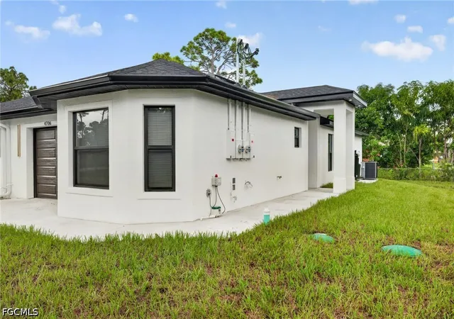 Photo 3 of Multi family home for sale at 4704 4706 30th Street Sw, Lehigh Acres, FL 33973 | MLS# 2026039775 | Listing updated on 2026-09-22