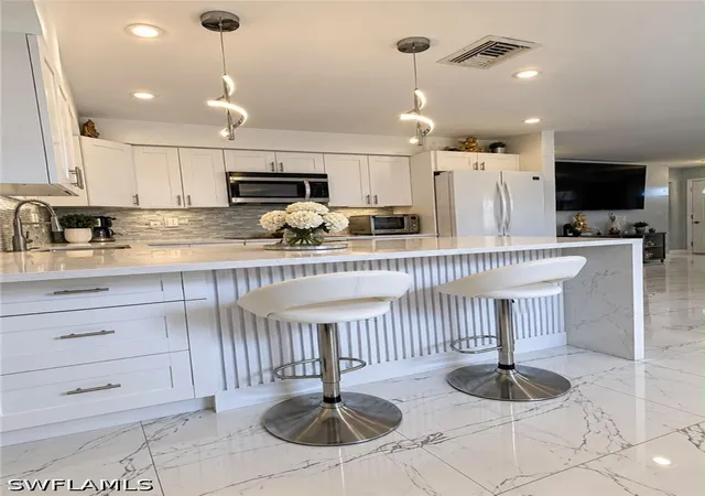 Listing Photo 4 - Condo for sale in building located at 1738 41st St SW, Naples, FL 34116