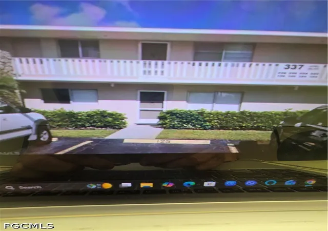 Listing Photo 1 - Condo for sale in building located at 341 Joel Blvd, Lehigh Acres, FL 33936 - Unit #217