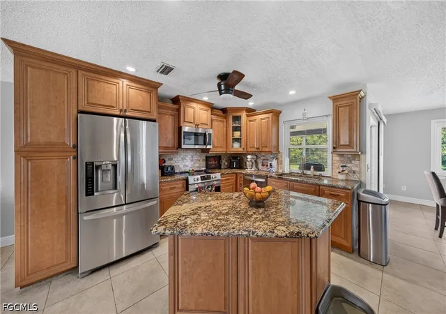 Photo 2 of Single family home for sale at 1523 SE 20th Place, Cape Coral, FL 33990 | MLS# 2026040566 | Listing updated on 2026-10-19