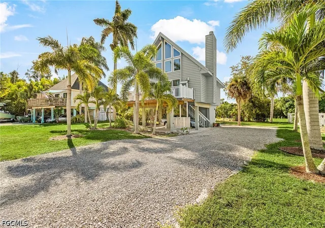 Photo 1 of Single family home for sale at 7443 Pomegranate Dr, Bokeelia, FL 33922 | MLS# 2026040666 | Listing updated on 2026-10-17
