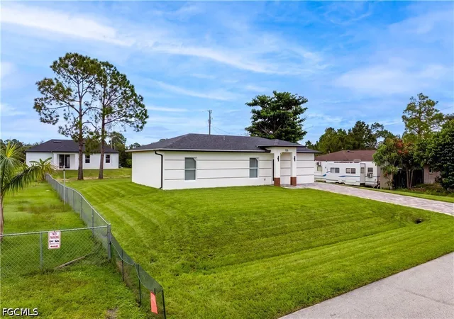 Photo 3 of Sale Pending at 755 Fleming Ave S, Lehigh Acres, FL 33974 | MLS# 2026041116 | Listing updated on 2026-10-19