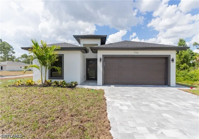 Photo 1 of Sale Pending at 733 Phelps St E, Lehigh Acres, FL 33974 | MLS# 226035274 | Listing updated on 2026-10-12
