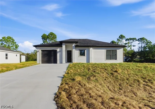 Photo 1 of Single family home for sale at 107 E 15th Street, Lehigh Acres, FL 33972 | MLS# 2026041382 | Listing updated on 2026-10-13