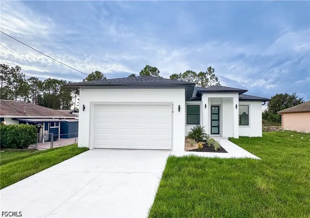 Photo 1 of Single family home for sale at 714 Carbon St E, Lehigh Acres, FL 33974 | MLS# 2026041389 | Listing updated on 2026-10-09