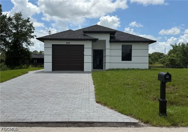 Photo 1 of Sale Pending at 868 Carbon St E, Lehigh Acres, FL 33974 | MLS# 2026041617 | Listing updated on 2026-10-16