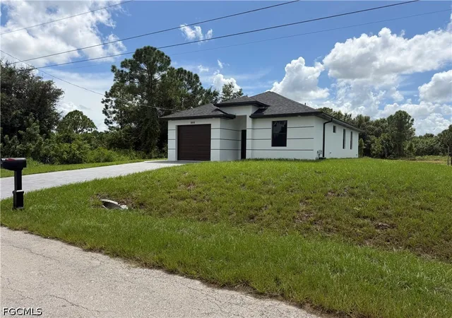 Photo 3 of Sale Pending at 868 Carbon St E, Lehigh Acres, FL 33974 | MLS# 2026041617 | Listing updated on 2026-10-16