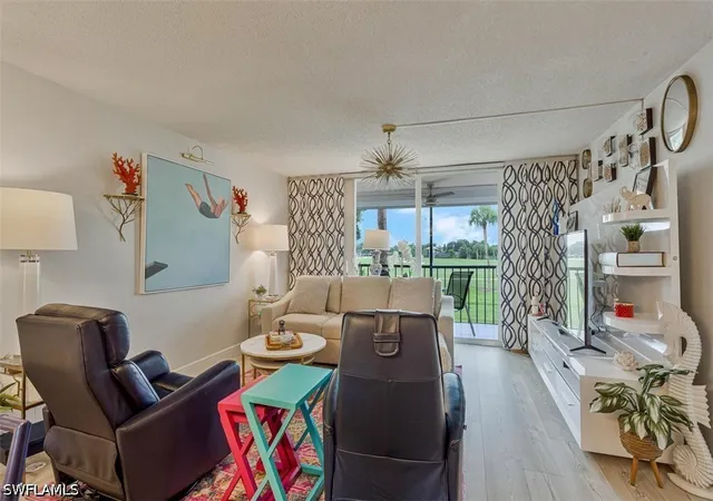 Listing Photo 1 - Condo for sale in building located at 4372 27Th Ct Sw, Naples, FL 34116 - Unit #203