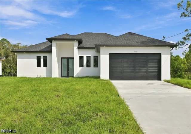 Photo 1 of Single family home for sale at 631 Foxchase Dr, Lehigh Acres, FL 33974 | MLS# 2026042062 | Listing updated on 2026-10-09