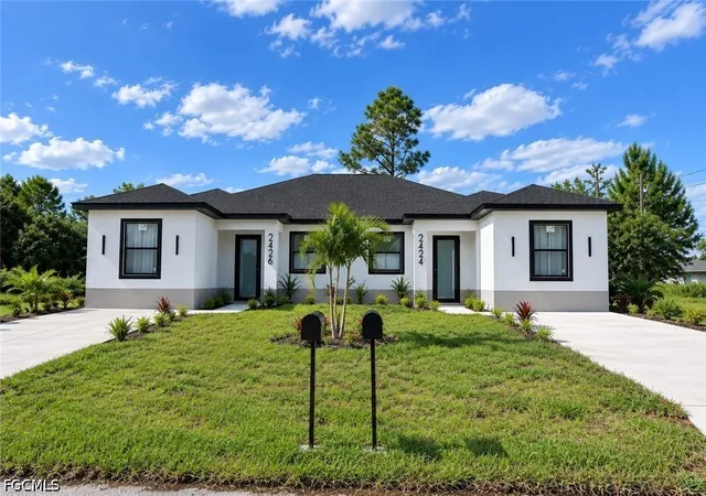 Photo 1 of Multi family home for sale at 2426 2424 Mae Ave S, Lehigh Acres, FL 33973 | MLS# 2026042221 | Listing updated on 2026-10-10