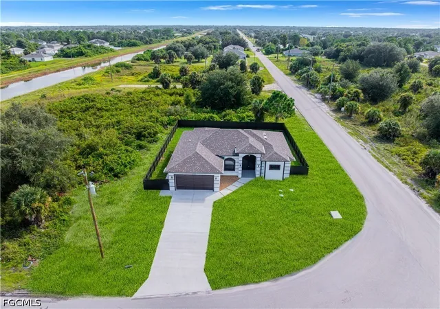 Photo 1 of Sale Pending at 5900 Queen Ave N, Lehigh Acres, FL 33971 | MLS# 2026042403 | Listing updated on 2026-10-21