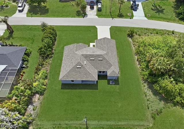 Photo 1 of Single family home for sale at 1406 Ford Cir, Lehigh Acres, FL 33936 | MLS# 2026042436 | Listing updated on 2026-10-19