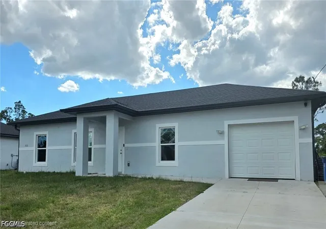 Photo 1 of Single family home for sale at 322 Mangonia Ave, Lehigh Acres, FL 33974 | MLS# 2026042543 | Listing updated on 2026-10-08