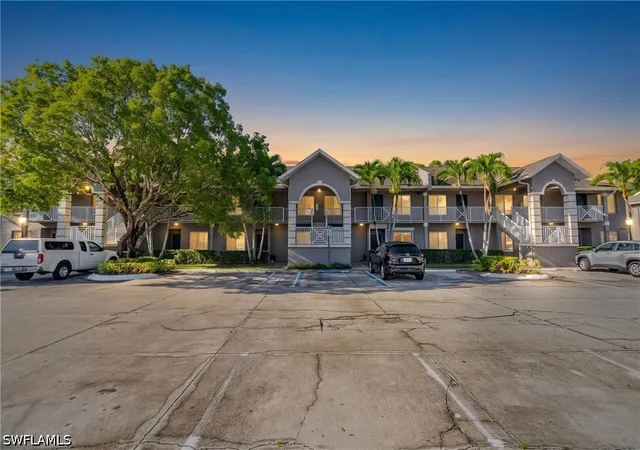 Listing Photo 1 - Condo for sale in building located at 5480 16Th Pl Sw, Naples, FL 34116 - Unit #203