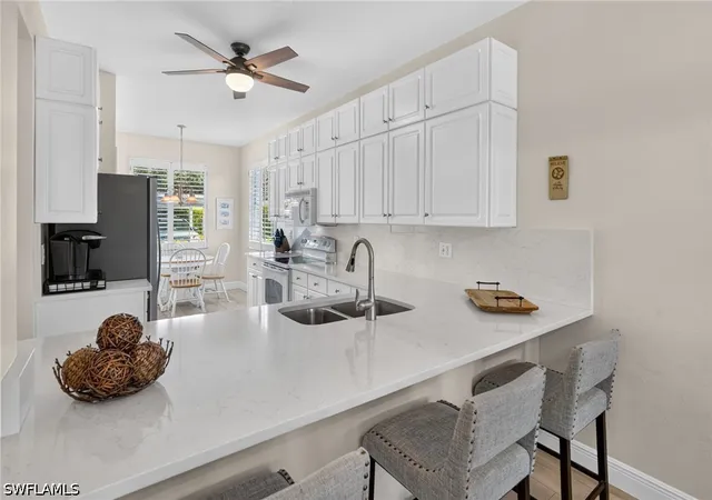 Listing Photo 3 - Condo for sale in building located at 9500 Highland Woods Blvd, Bonita Springs, FL 34135 - Unit #7101