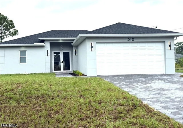 Photo 1 of Single family home for sale at 318 Genoa Ave S, Lehigh Acres, FL 33974 | MLS# 2026042627 | Listing updated on 2026-10-09