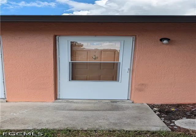 Listing Photo 2 - Condo for sale in building located at 1031 Se 9Th St, Cape Coral, FL 33990 - Unit #5