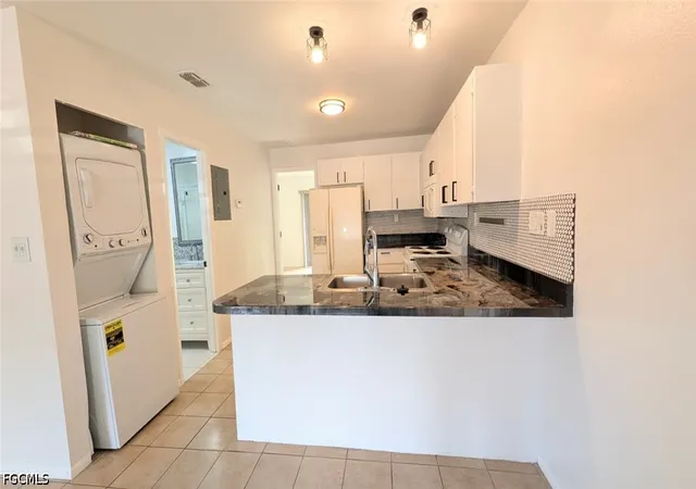 Listing Photo 5 - Condo for sale in building located at 1031 Se 9Th St, Cape Coral, FL 33990 - Unit #5