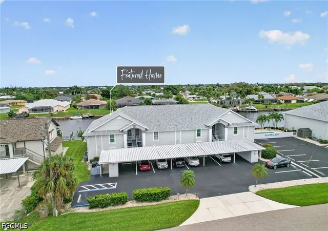 Listing Photo 1 - Condo for sale in building located at 3927 Se 11Th Pl, Cape Coral, FL 33904 - Unit #105