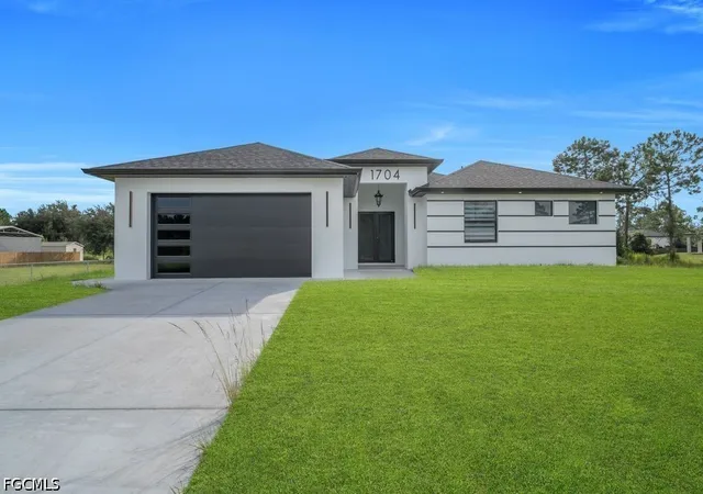 Photo 3 of Single family home for sale at 1704 Clayton Ave, Lehigh Acres, FL 33972 | MLS# 2026042733 | Listing updated on 2026-10-12