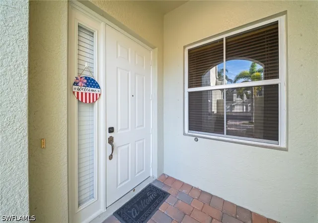 Listing Photo 3 - Condo for sale in building located at 1405 Mariposa Cir, Naples, FL 34105 - Unit #11202