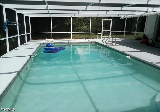 Photo 3 of Single family home for sale at 10300 Mcgregor Blvd, Fort Myers, FL 33919 | MLS# 2026042888 | Listing updated on 2026-10-16