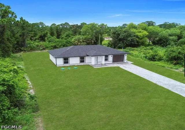 Photo 1 of Single family home for sale at 382 Mcarthur Blvd, Lehigh Acres, FL 33974 | MLS# 2026043033 | Listing updated on 2026-10-12