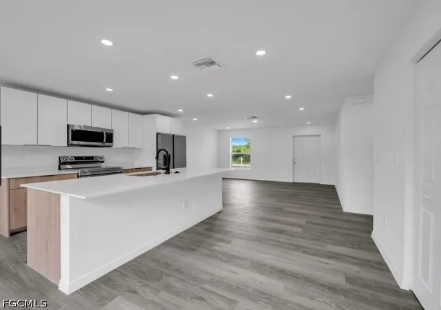 Photo 4 of Single family home for sale at 382 Mcarthur Blvd, Lehigh Acres, FL 33974 | MLS# 2026043033 | Listing updated on 2026-10-12