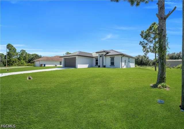 Photo 1 of Single family home for sale at 13 W 9th Street, Lehigh Acres, FL 33972 | MLS# 2026043082 | Listing updated on 2026-10-13