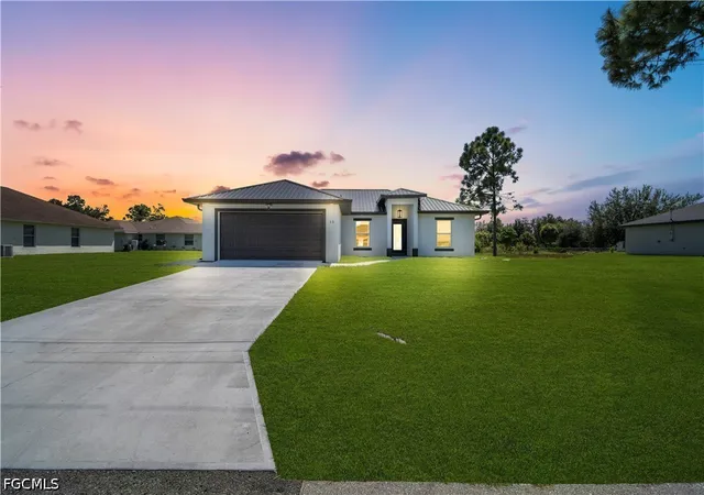 Photo 2 of Single family home for sale at 13 W 9th Street, Lehigh Acres, FL 33972 | MLS# 2026043082 | Listing updated on 2026-10-13