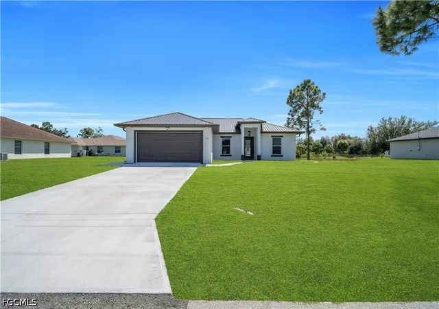 Photo 3 of Single family home for sale at 13 W 9th Street, Lehigh Acres, FL 33972 | MLS# 2026043082 | Listing updated on 2026-10-13