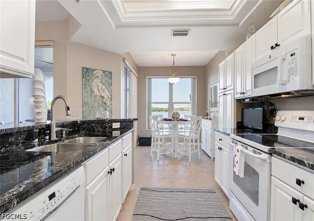 Listing Photo 1 - Condo for sale in building located at 2627 Somerville Loop, Cape Coral, FL 33991 - Unit #606