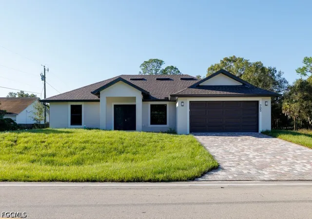 Photo 1 of Single family home for sale at 705 W 10th Street, Lehigh Acres, FL 33972 | MLS# 2026043253 | Listing updated on 2026-10-17